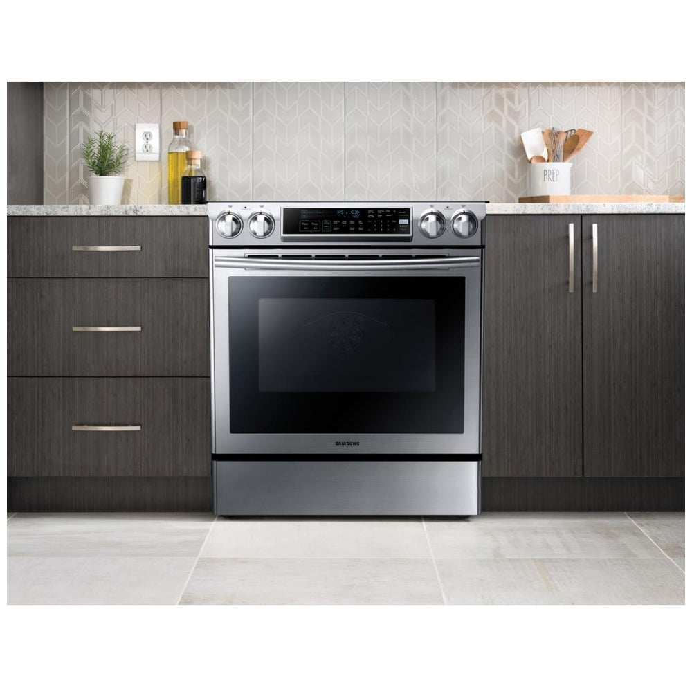 Samsung 30" Slide-In Electric Range with Dual Convection, Stainless Steel, Installed in a Modern Kitchen Setting.